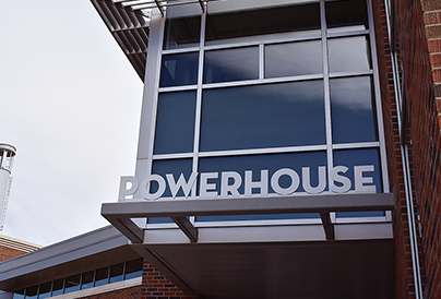 Signage of the "POWERHOUSE" building displayed prominently on a modern architectural facade.